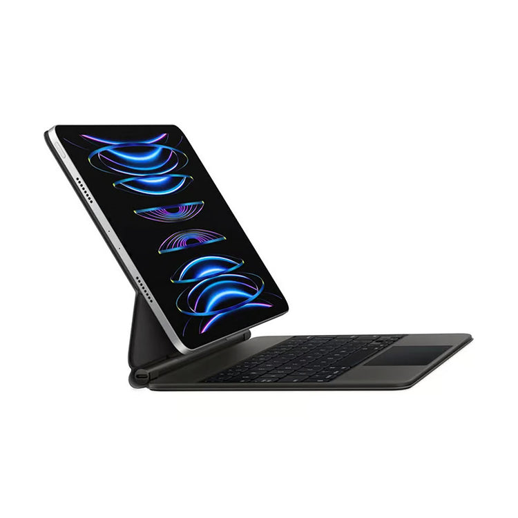Apple iPad på Magic Keyboard med skærm tændt og futuristisk grafik, tablet tilbehør