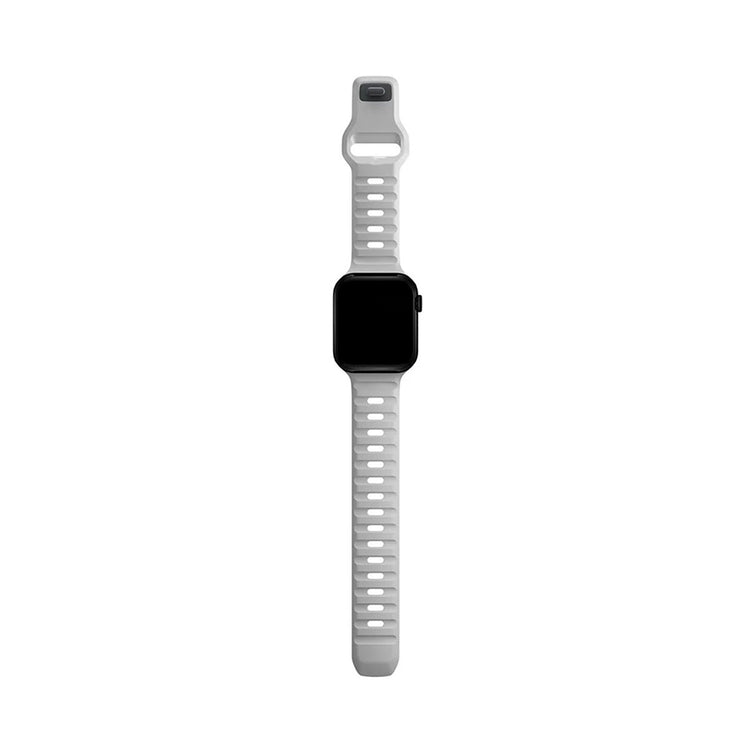 Smartwatch med hvidt silikone urrem, set forfra, på hvid baggrund